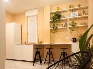 Cucina o angolo cottura di Four Rooms Alghero