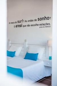 Uma cama ou camas num quarto em Hotel Alcatruz