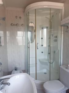 Koupelna v ubytování Hotel Dracos