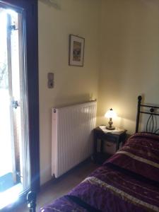 A bed or beds in a room at Optasia