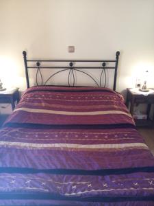 A bed or beds in a room at Optasia