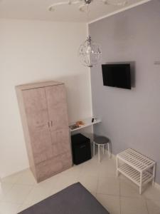 TV a/nebo společenská místnost v ubytování B&b regina del porto