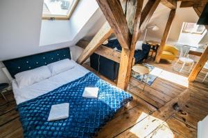 Posteľ alebo postele v izbe v ubytovaní Apartamenty Jęczmienna 29