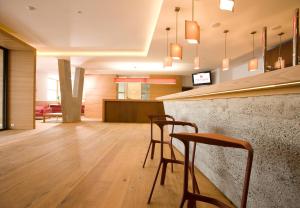 TV a/nebo společenská místnost v ubytování Hotel Manggei Designhotel Obertauern