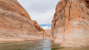 a view of the water in a slot canyon at Under Canvas Lake Powell-Grand Staircase in Big Water