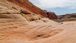 a view of a cliff in the desert at Under Canvas Lake Powell-Grand Staircase in Big Water