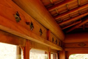 a room with a window with butterflies on the ceiling at Hakone Kowakien Mikawaya Ryokan in Hakone