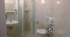 Koupelna v ubytování Hotel Astoria