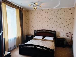 Кровать или кровати в номере Hotel Status