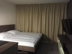 Posteľ alebo postele v izbe v ubytovaní Rovná 7 Apartment