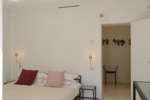 Llit o llits en una habitació de Palazzo Soderini