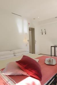 Llit o llits en una habitació de Palazzo Soderini