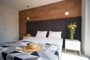 Ένα ή περισσότερα κρεβάτια σε δωμάτιο στο White Villas Koblevo