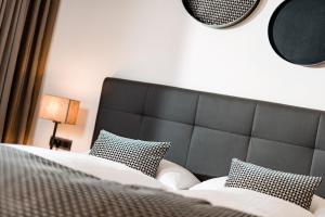 Postel nebo postele na pokoji v ubytování Hotel Brunnhofer