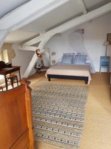 Katil atau katil-katil dalam bilik di Propriété Le Monneton