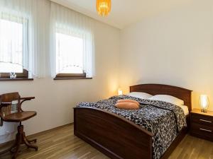 Łóżko lub łóżka w pokoju w obiekcie ZAKOHOME- Z Widokiem Na Tatry Cieniówka