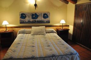 Łóżko lub łóżka w pokoju w obiekcie Casa La Abuela de Vicente