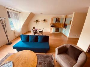 Posedenie v ubytovaní Apartamenty przy Zamku