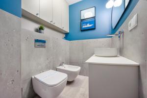 Kúpeľňa v ubytovaní Apartamenty Sun & Snow Residence II Jastrzębia Góra - plac zabaw, blisko plaży, wysoki standard