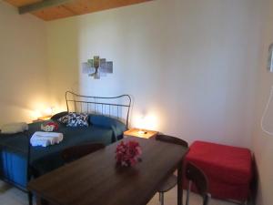 Giường trong phòng chung tại Casa Vacanze Barone di Civico 24