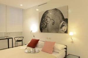 Llit o llits en una habitació de Palazzo Soderini