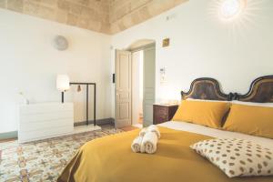 Postel nebo postele na pokoji v ubytování Masseria Gagliardi