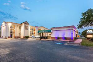 a rendering of a hotel with a parking lot at Days Inn by Wyndham Hampton Near Coliseum Convention Center in Hampton