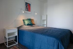 Posteľ alebo postele v izbe v ubytovaní Marina Apartman Hotel