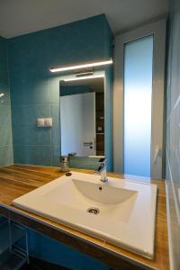 Kúpeľňa v ubytovaní Marina Apartman Hotel