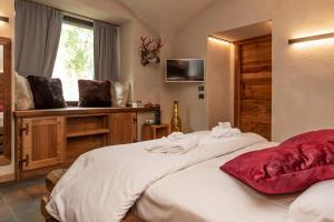 Postel nebo postele na pokoji v ubytování Hotel K2
