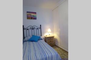 Posteľ alebo postele v izbe v ubytovaní Fabulosa casa de Vacaciones junto al mar