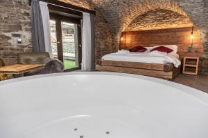 Postel nebo postele na pokoji v ubytování Hotel K2