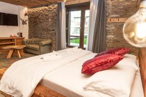 Postel nebo postele na pokoji v ubytování Hotel K2
