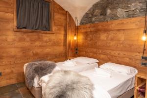 Postel nebo postele na pokoji v ubytování Hotel K2