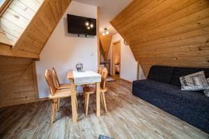 Posedenie v ubytovaní Apartament Stary Mlyn