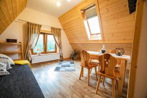 Posedenie v ubytovaní Apartament Stary Mlyn