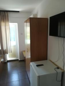 TV a/nebo společenská místnost v ubytování vila CALIL