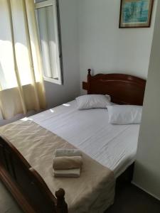 Postel nebo postele na pokoji v ubytování vila CALIL