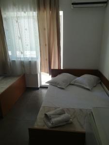 Postel nebo postele na pokoji v ubytování vila CALIL