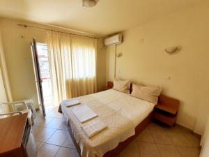 Postel nebo postele na pokoji v ubytování Casa Soarelui