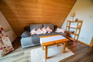 Posedenie v ubytovaní Apartament Stary Mlyn
