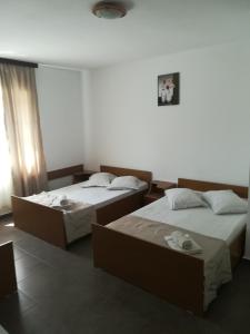 Postel nebo postele na pokoji v ubytování vila CALIL