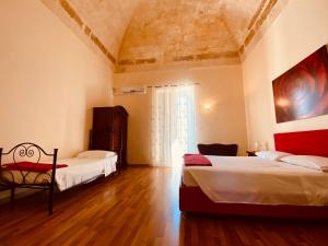 Postel nebo postele na pokoji v ubytování B&B Porta Grande