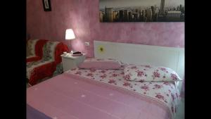 Postel nebo postele na pokoji v ubytování Suites Florence