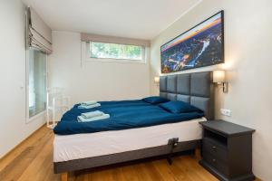 Кровать или кровати в номере Gustav Apartments - City Center Comfort