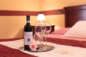 Posteľ alebo postele v izbe v ubytovaní Cascina Pugnane