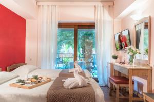 Postel nebo postele na pokoji v ubytování Hotel Brascos + 37 fotografií