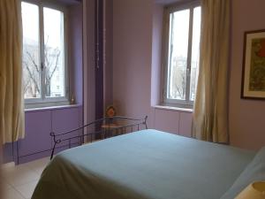 Postel nebo postele na pokoji v ubytování Torino in Colore