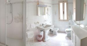 Koupelna v ubytování B&B Corte Campana + 5 fotografií