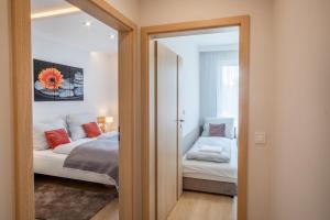 Posteľ alebo postele v izbe v ubytovaní MyFlat Casa Luxury Apartment